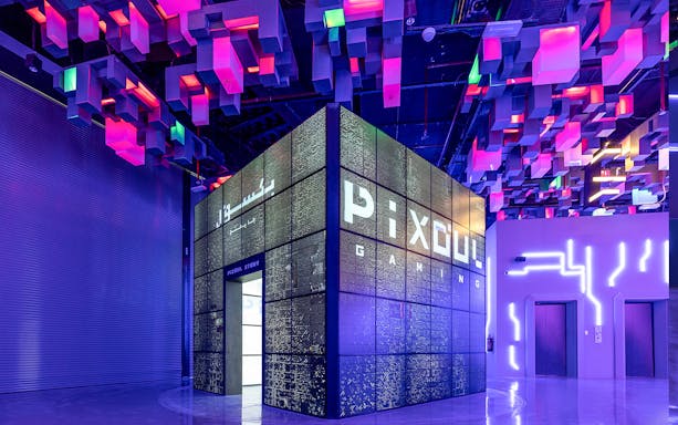 Pixoul Gaming entrance with neon lights in Abu Dhabi.