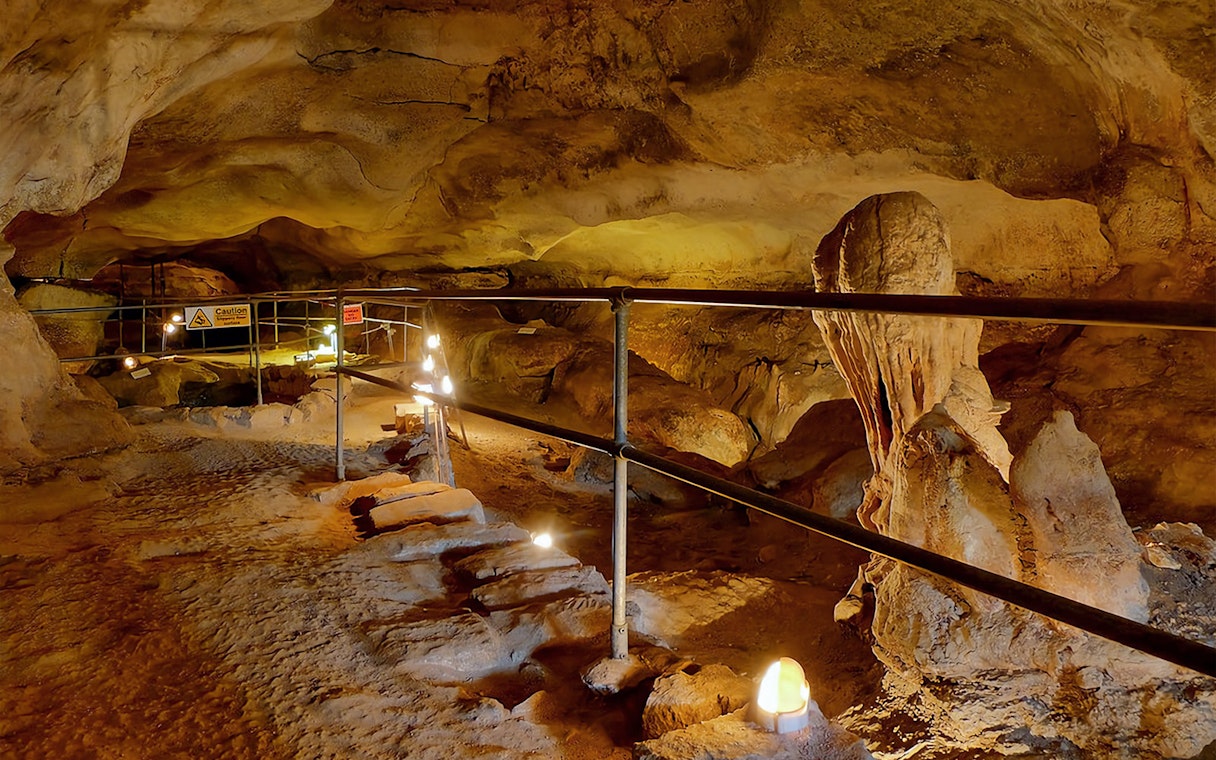 Cave interior with stalactites and stalagmites on the Prehistoric Temples & Highlights of the South tour.