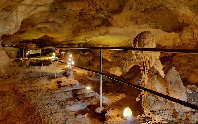 Cave interior with stalactites and stalagmites on the Prehistoric Temples & Highlights of the South tour.