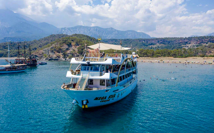 Mega Star Antalya-Kemer Boat Cruise with Lunch and DJ