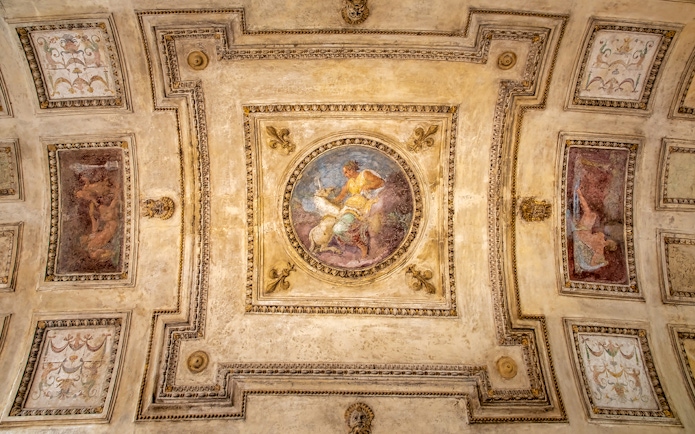 Ceiling fresco at Castel Sant'Angelo in Rome, Italy, featuring mythological scene.