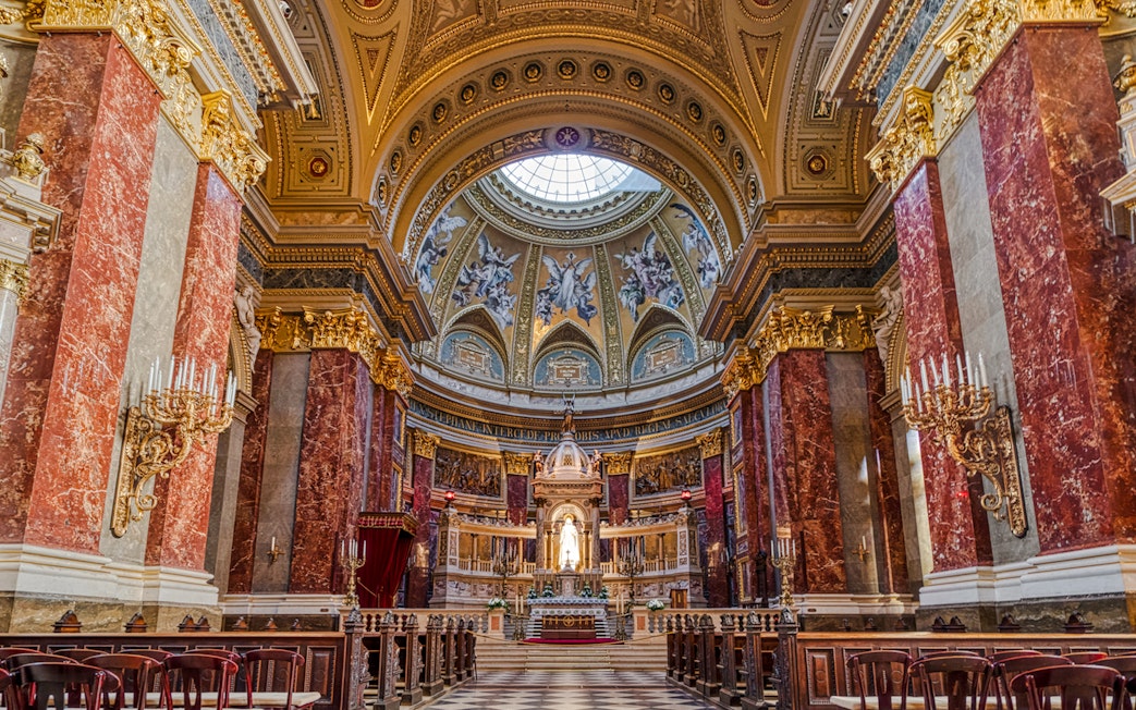 St. Stephen's Basilica interior with ornate dome and altar, Budapest, Hungary.