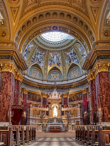 St. Stephen's Basilica interior with ornate dome and altar, Budapest, Hungary.