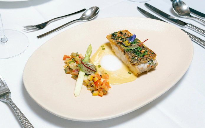 Gourmet dish served on Ha Long Bay 5-Star Ambassador Cruise.