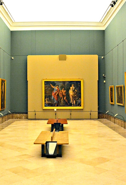 Interior of Museo di Capodimonte, Naples, featuring classic paintings on display.