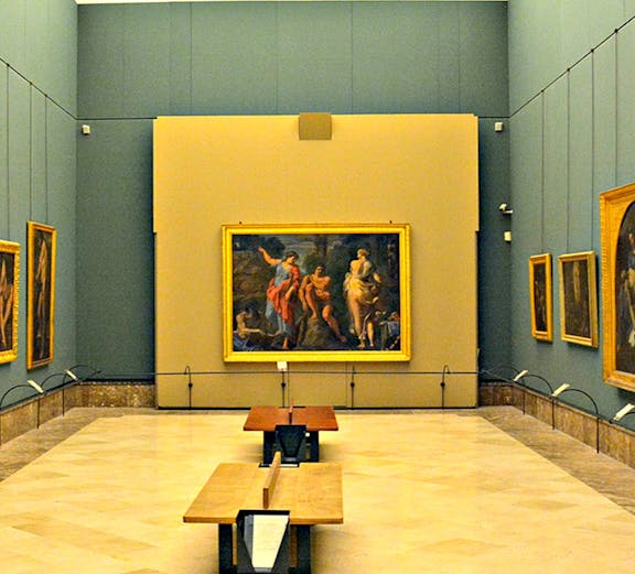 Interior of Museo di Capodimonte, Naples, featuring classic paintings on display.