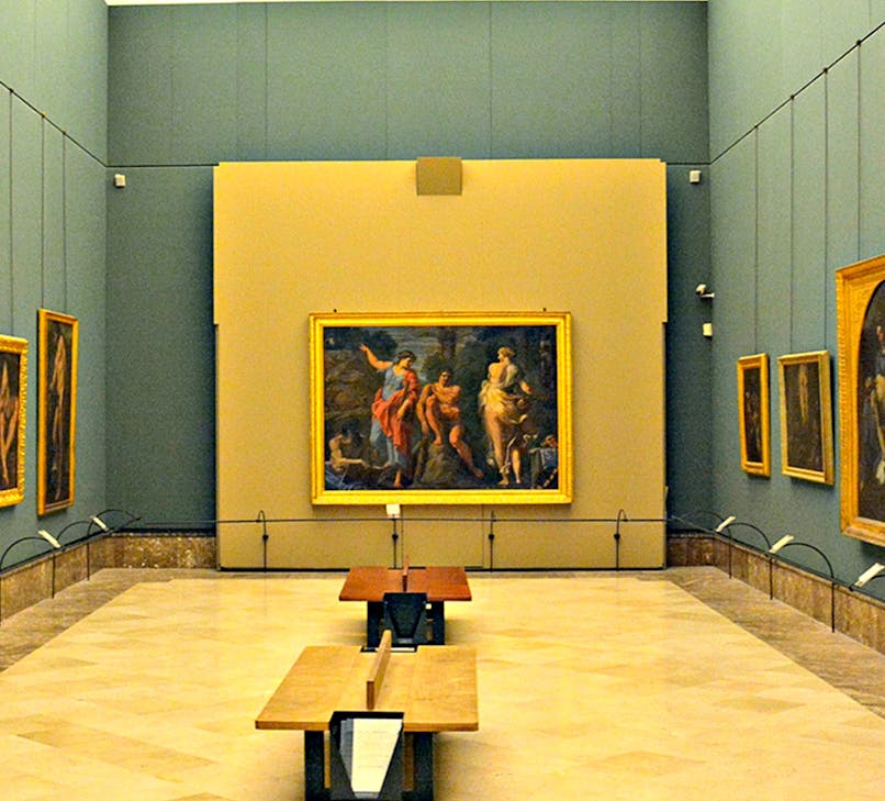 Visitors exploring art exhibits at Museo di Capodimonte, Naples.