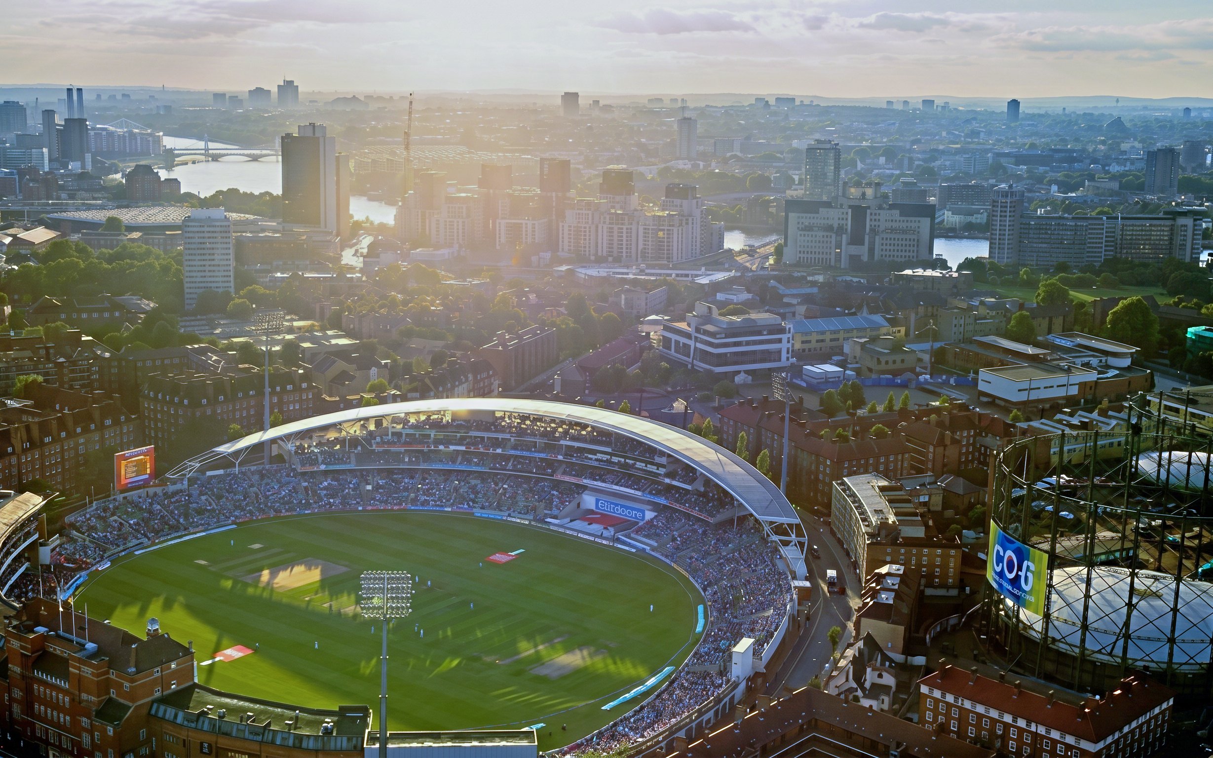 Aerial view of Kia Oval Stadium in London during a cricket match.