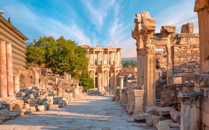 Celsus Library ruins in Ephesus, Turkey with ancient stone columns and clear sky.