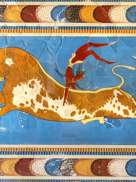 Bull-leaping fresco at Knossos Palace, Crete, depicting ancient Minoan ritual.