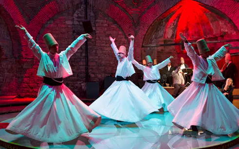 Whirling Dervishes performing in a traditional ceremony, Cappadocia.