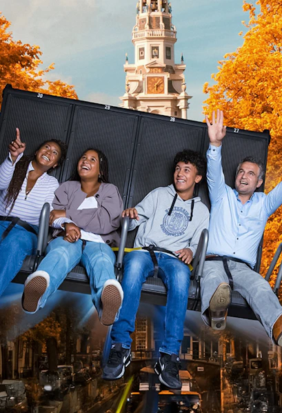 Visitors enjoying the 5D Ultimate Flight Experience at This Is Holland with Amsterdam backdrop.