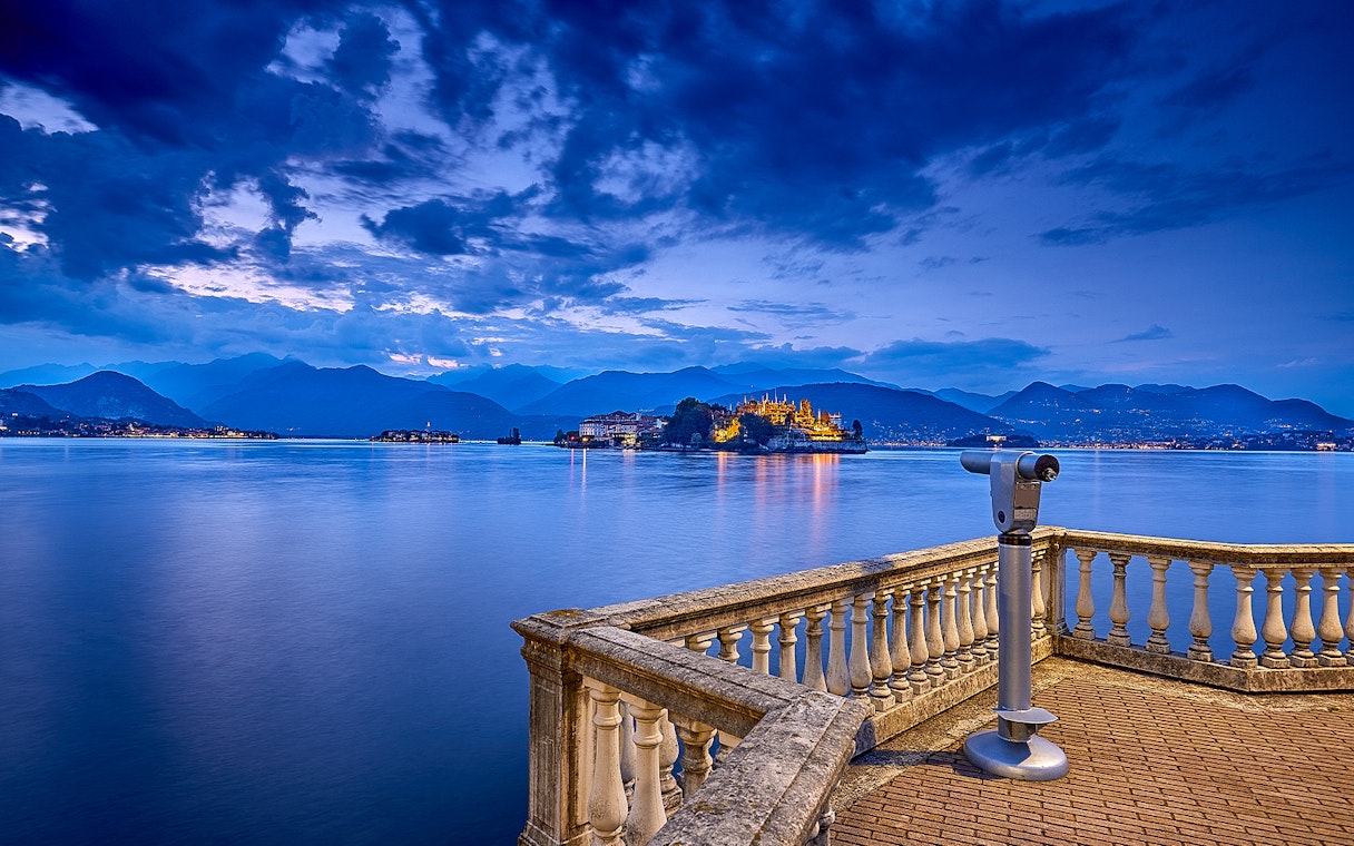 View of Isola Bella from a lakeside terrace with telescope, Isole Borromee tour.