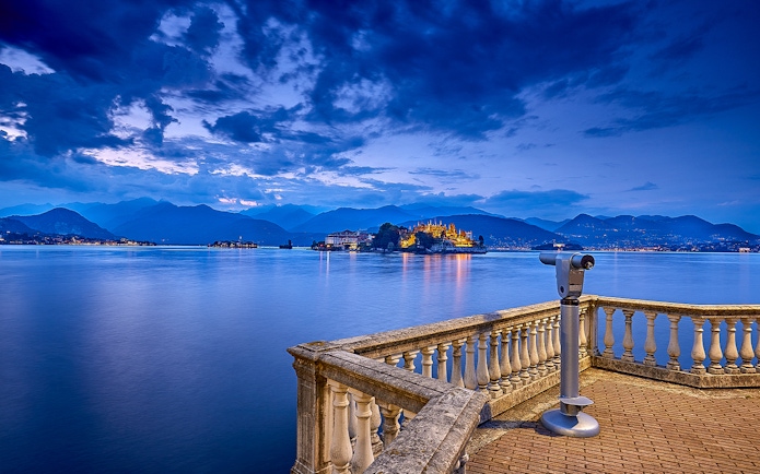 View of Isola Bella from a lakeside terrace with telescope, Isole Borromee tour.
