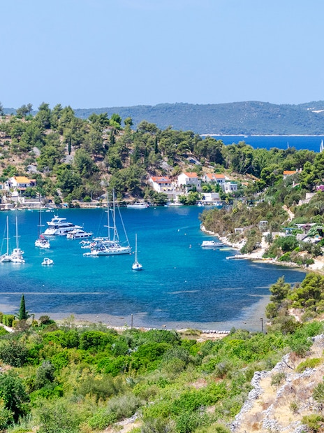 Scenic view of Bobovisca harbor with boats on Brac island, Croatia.