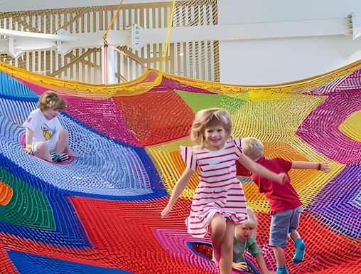 Children playing on colorful nets at Olioli Children's Play Museum, Dubai.