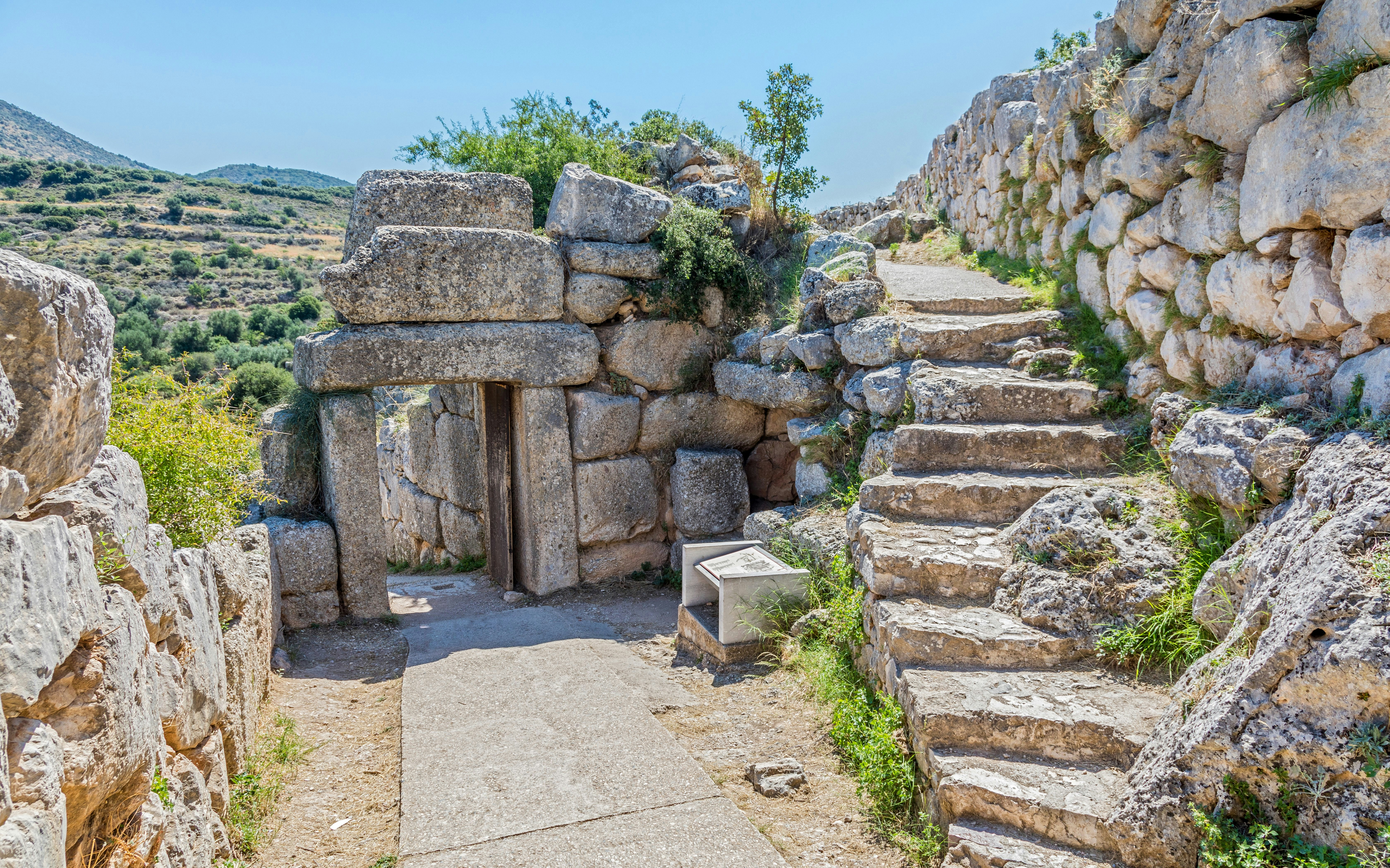 Stone pathway and entrance at the Ancient Citadel of Mycenae, Greece.