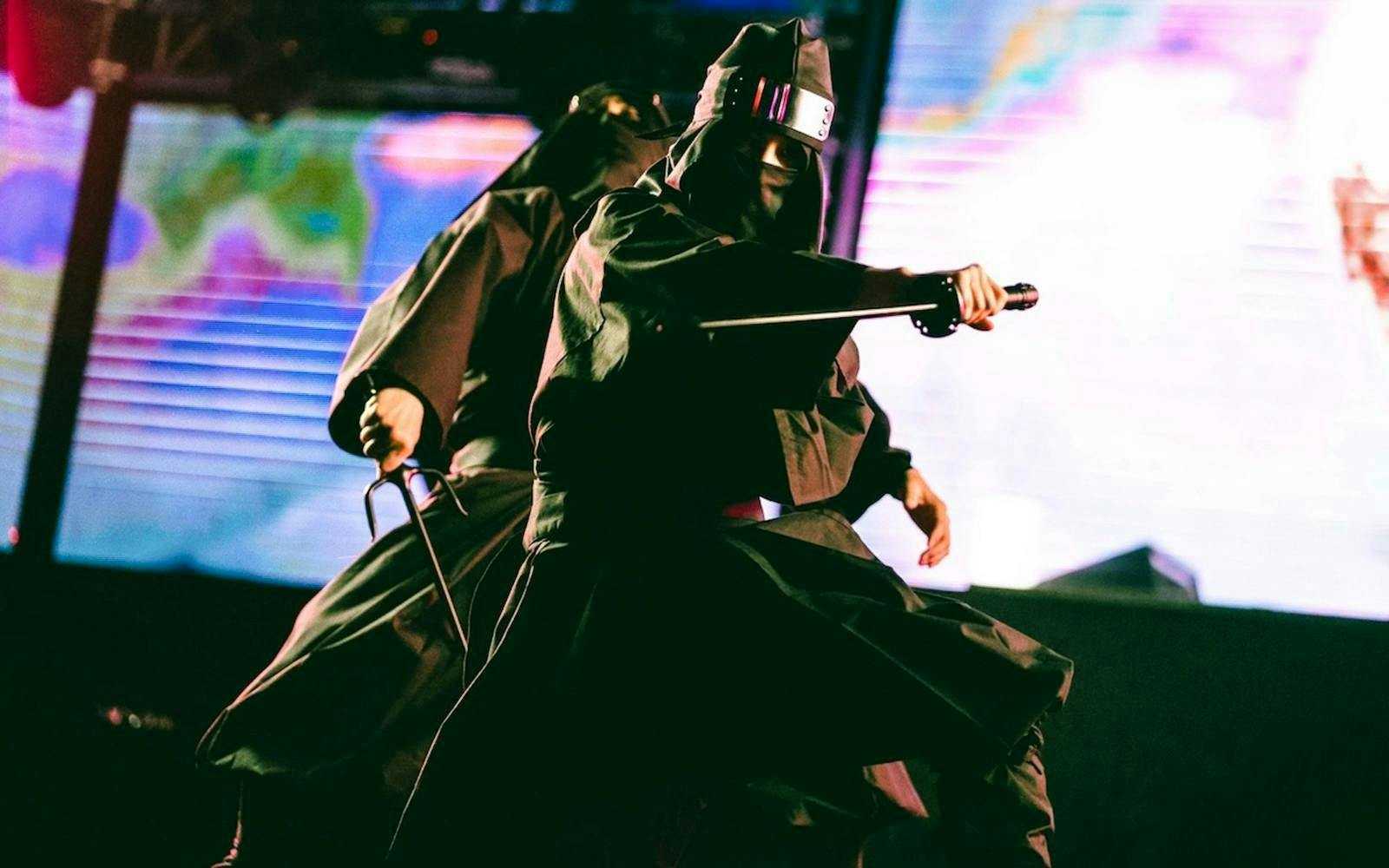 Ninjas performing sword fight at Ninja & Kabuki Live Show in Shinjuku.