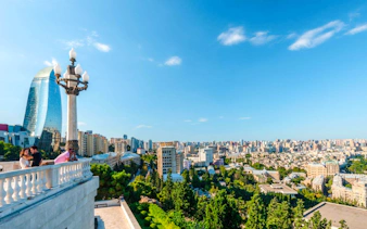 Baku cityscape with Flame Towers and skyline view during city tour.