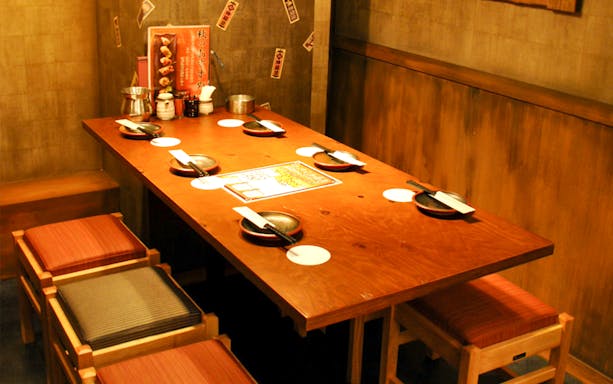Dining setup at Hakata Dojo Ueno with traditional Japanese tableware.