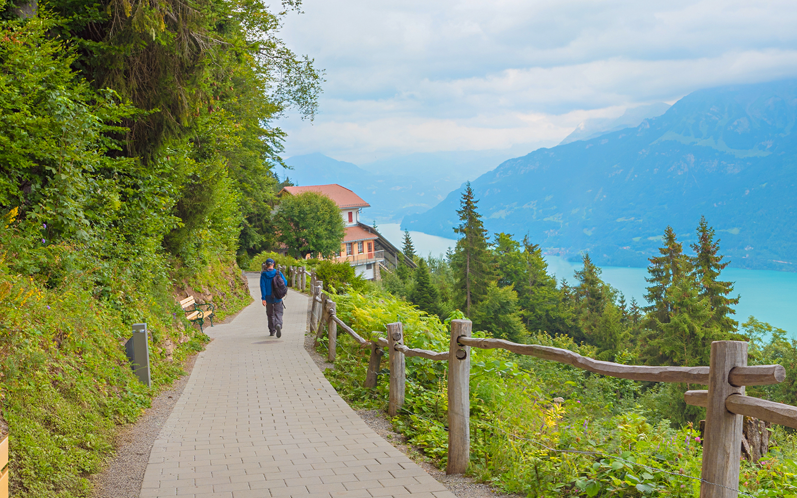 Hiking trail view of Harder Kulm with scenic mountain backdrop in Interlaken, Switzerland.