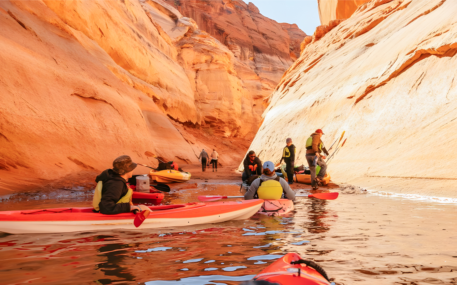 Kayakers navigating through Antelope Canyon on Lake Powell.