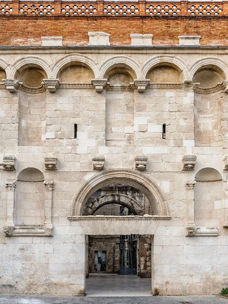 Diocletian's Palace entrance in Split, Croatia, showcasing ancient Roman architecture.