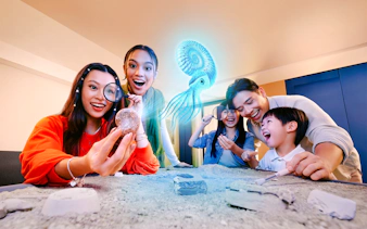 Visitors exploring fossils at a shop in the Singapore Oceanarium.