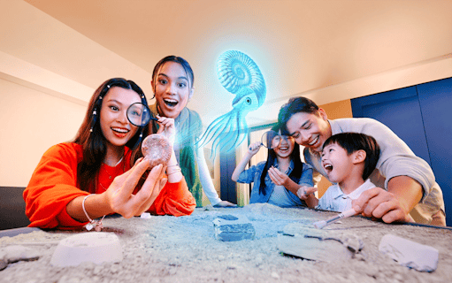Visitors exploring fossils at a shop in the Singapore Oceanarium.