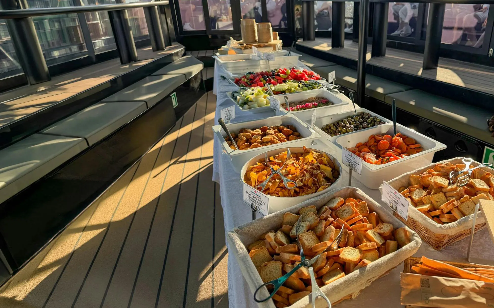 Buffet spread on a boat deck during Albufeira Algarve sunset sailing tour.