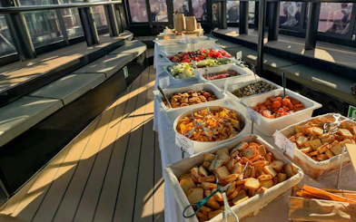 Buffet spread on a boat deck during Albufeira Algarve sunset sailing tour.