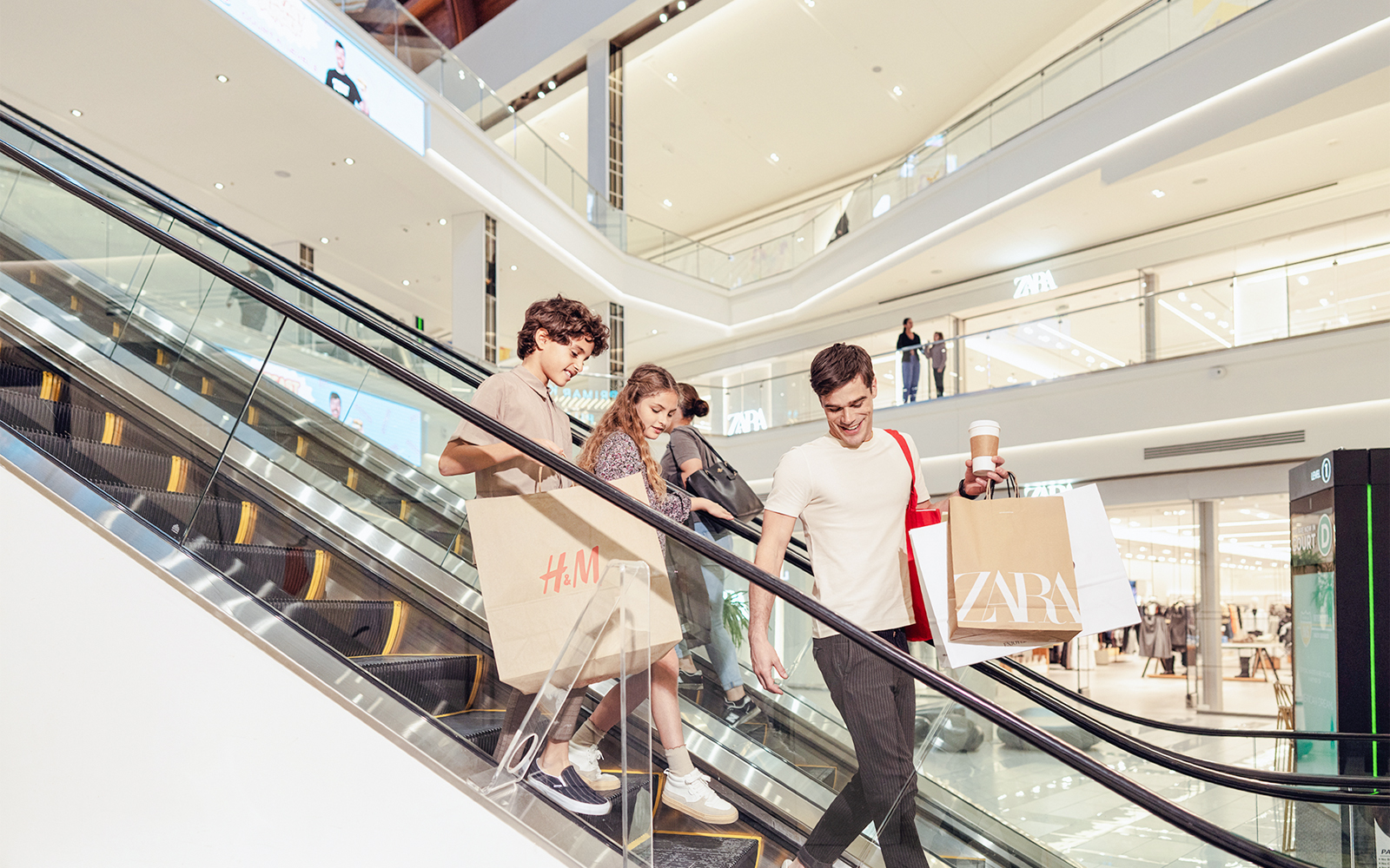 American Dream retail shops with visitors exploring various stores.