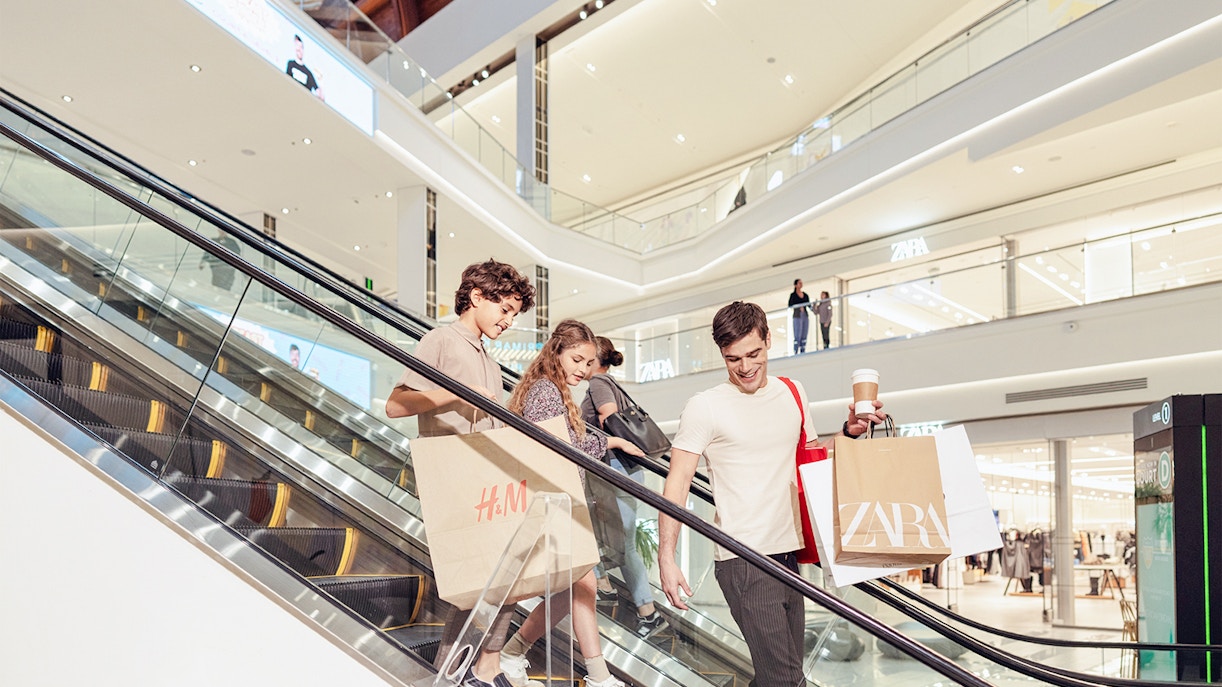 American Dream retail shops with visitors exploring various stores.
