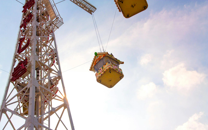 Hanayashiki amusement park ride tower and gondola in Asakusa, Tokyo, Japan.