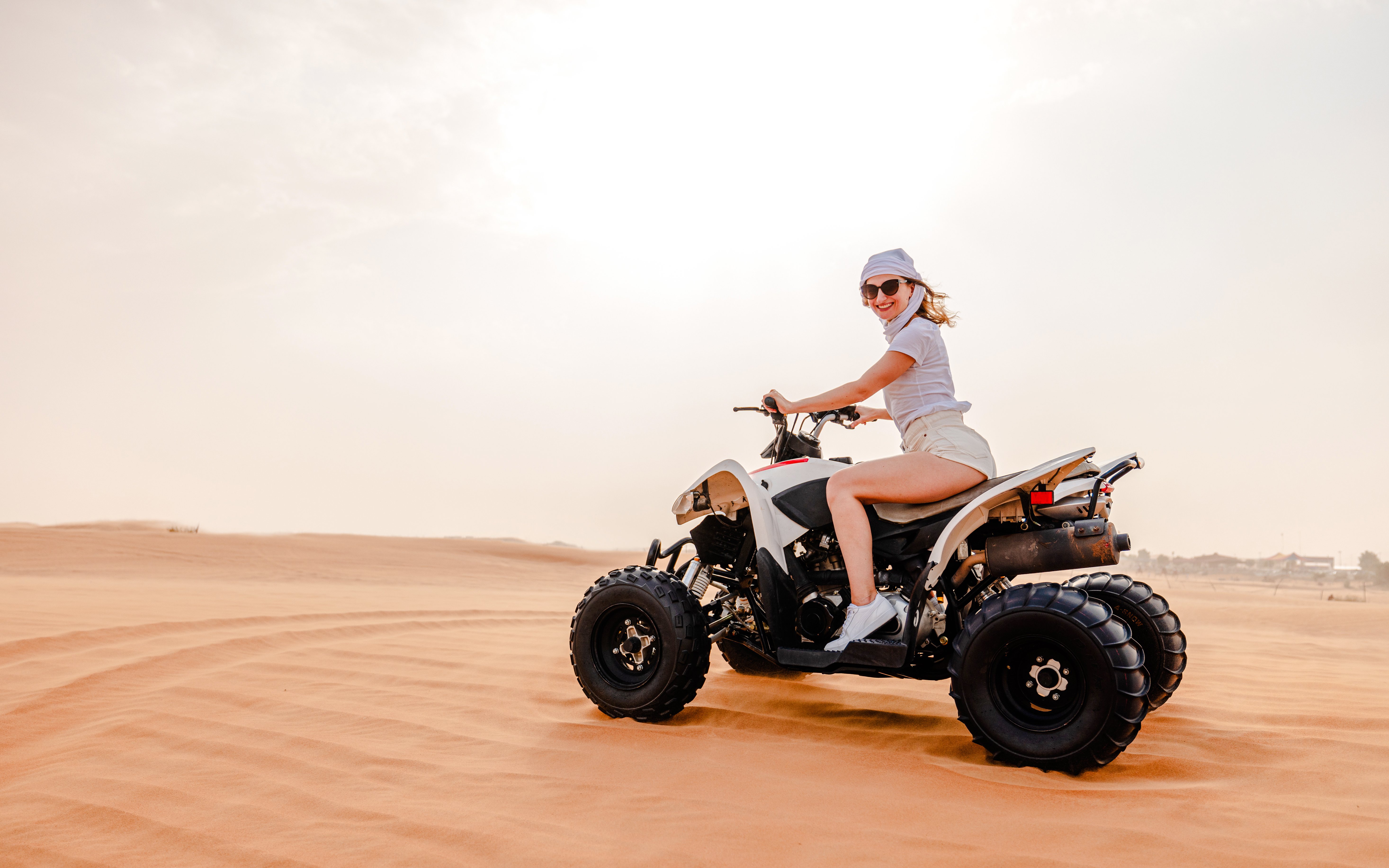 Quad biking adventure in the Doha desert, Qatar.