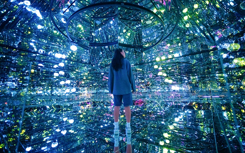 Tourists engaging with digital art installations at House of Hype, an interactive experience in New York City.