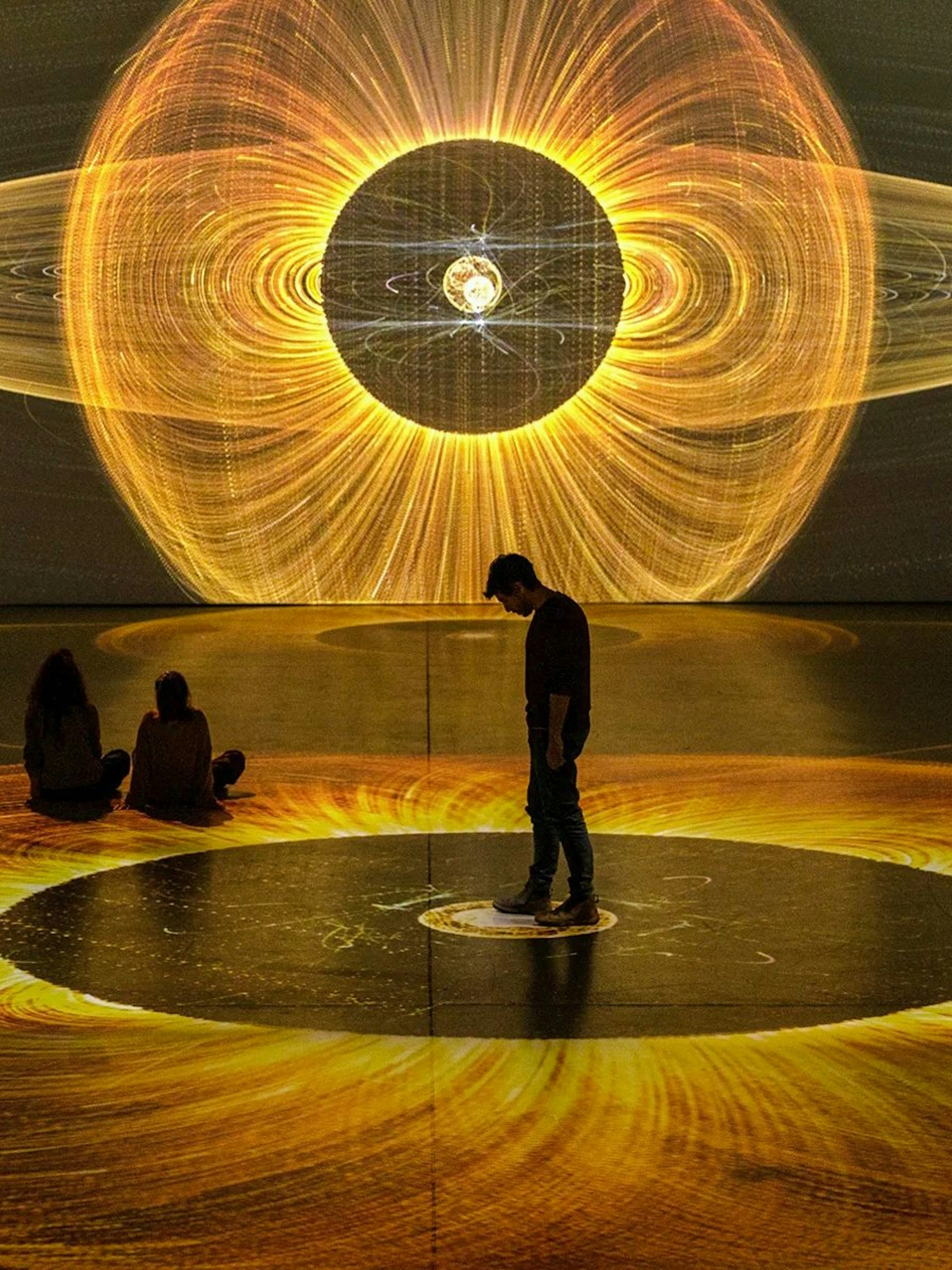 Guests viewing digital art projections at Signal Space Digital Art Gallery.