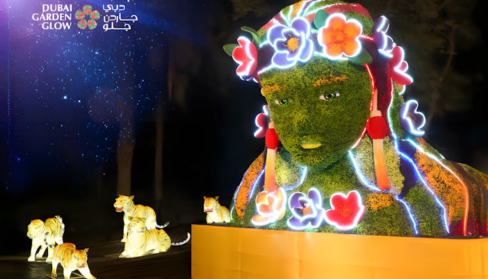 Dubai Garden Glow illuminated sculpture with floral design and glowing tigers.