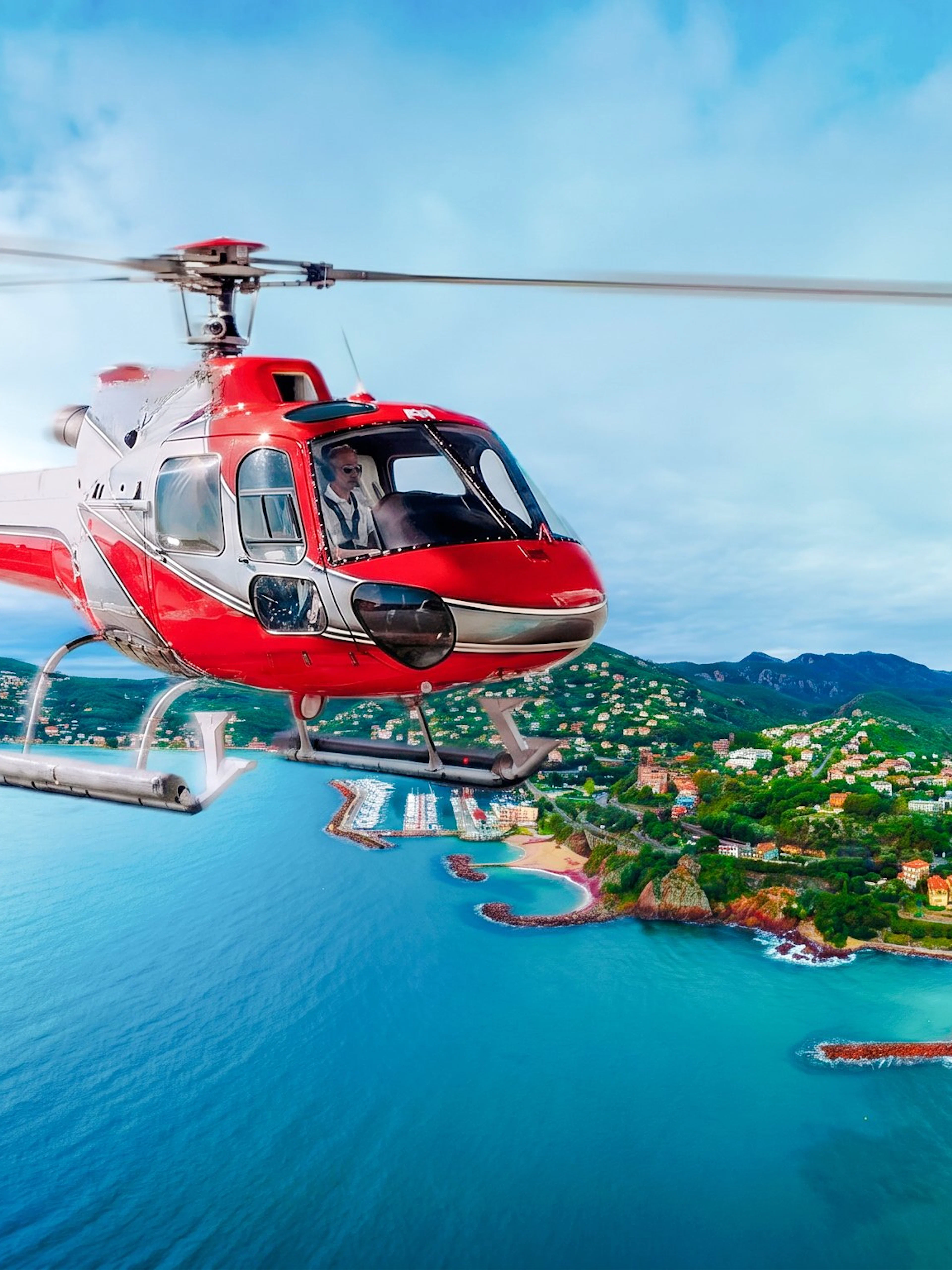Helicopter flying over Monaco coastline with cityscape and sea views.