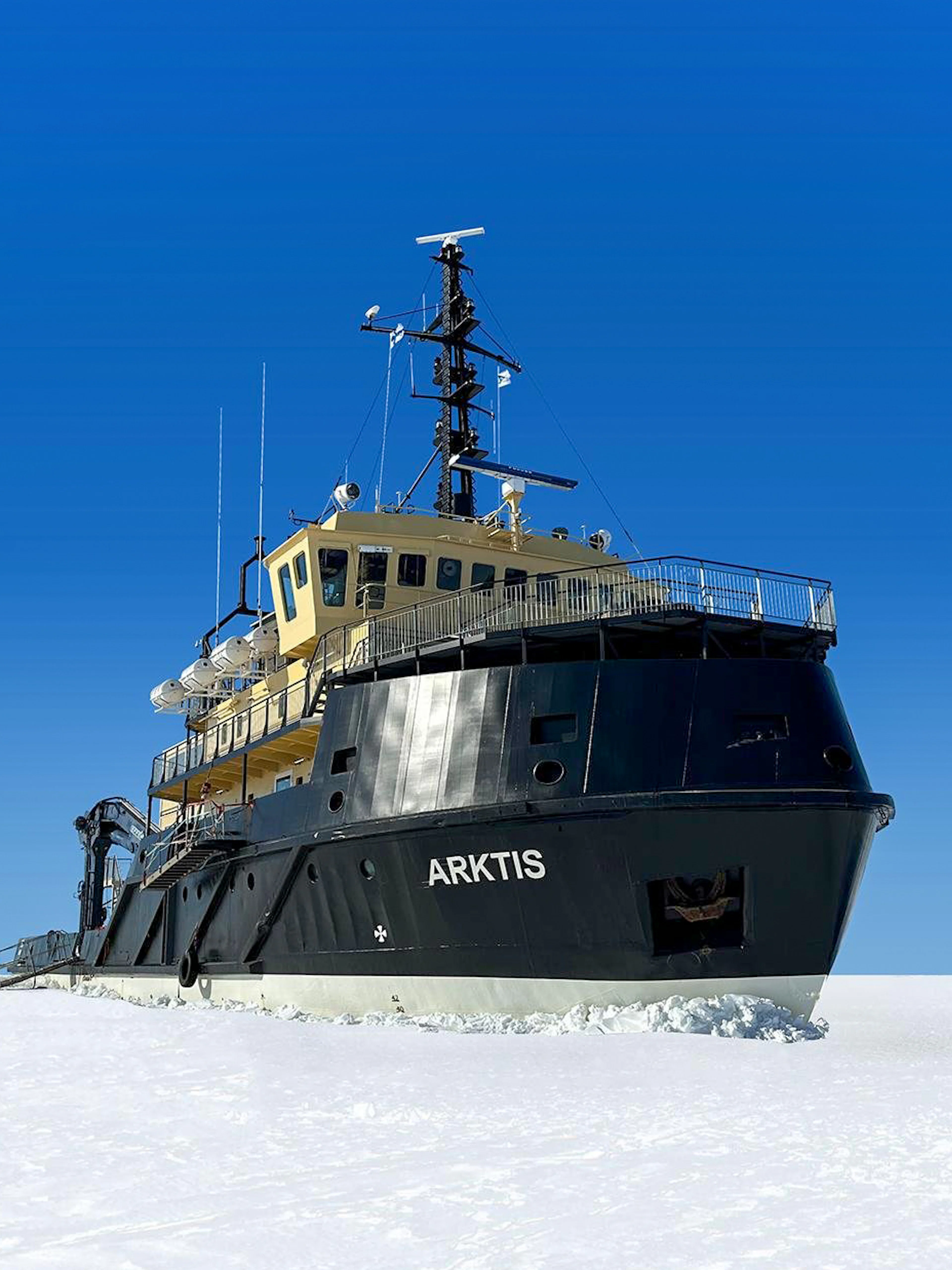 Icebreaker Arktis navigating frozen sea on Kemi cruise.