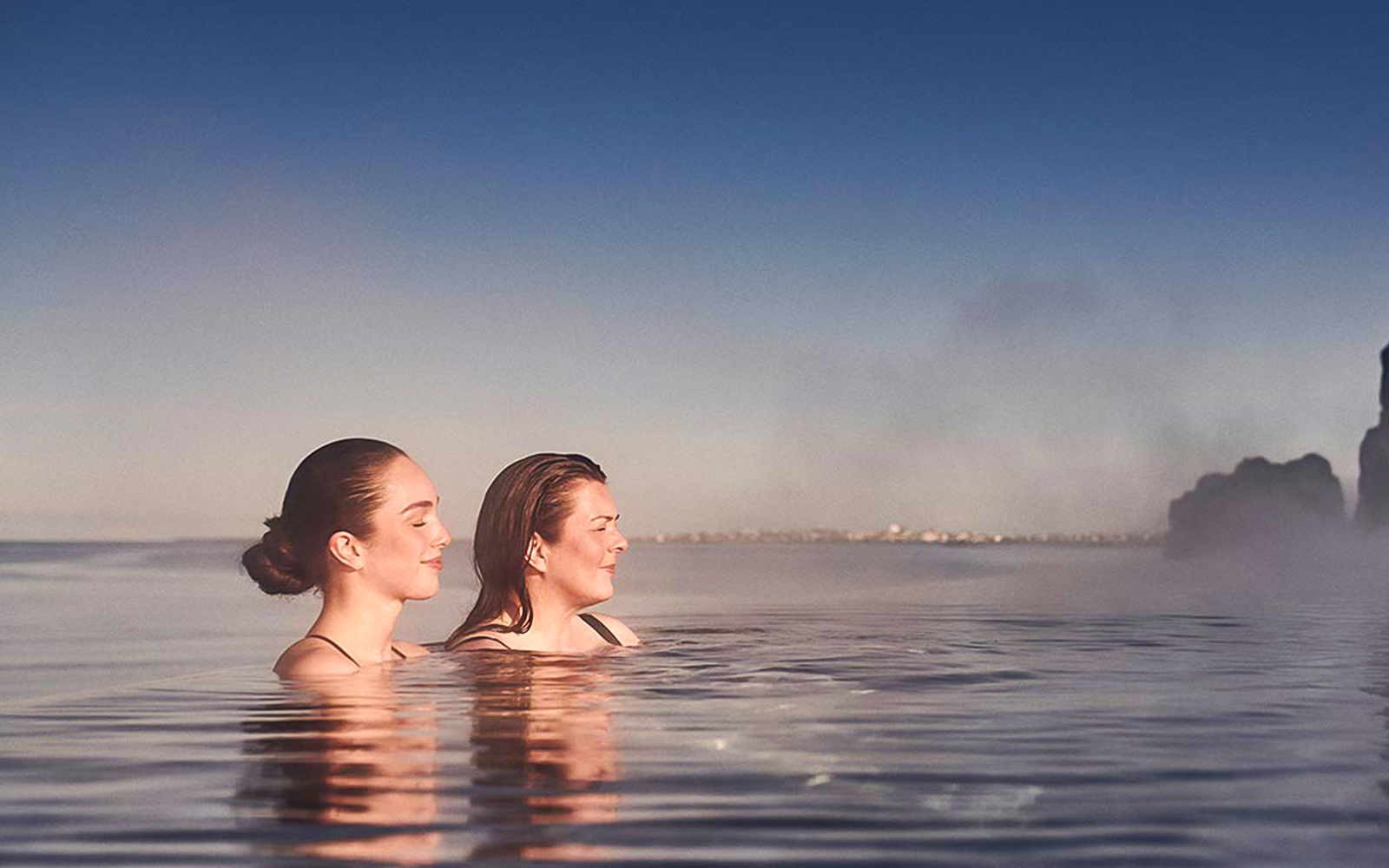 Guests enjoying the warm waters at Sky Lagoon, Iceland.