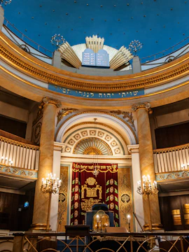Stadttempel interior with ornate ark and chandeliers, Vienna, Austria.