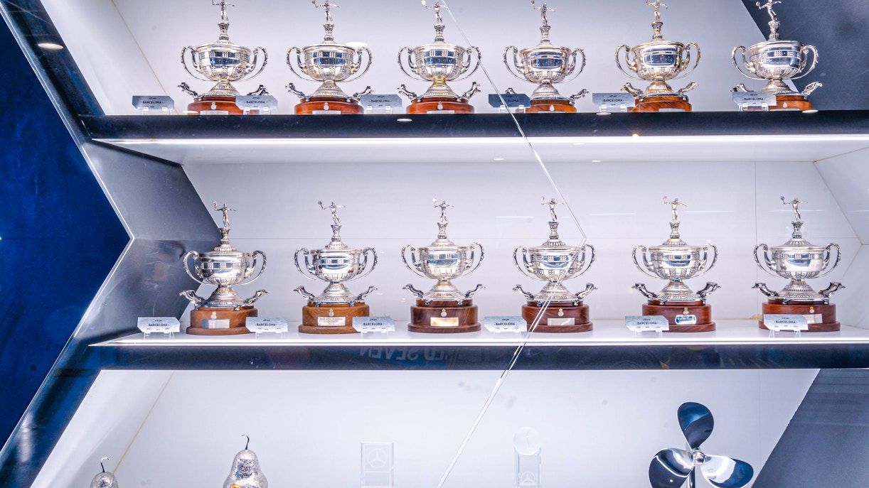 Trophy cabinet at Rafa Nadal Museum Xperience displaying tennis awards in Mallorca, Spain.
