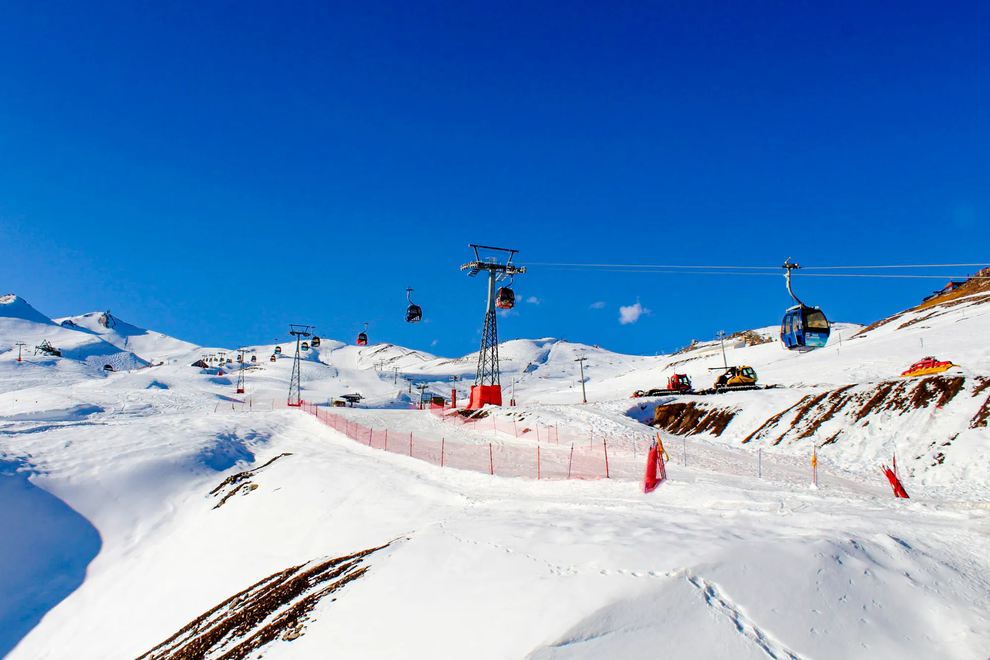 Ski lifts and snowy slopes at Valle Nevado, Santiago tour.