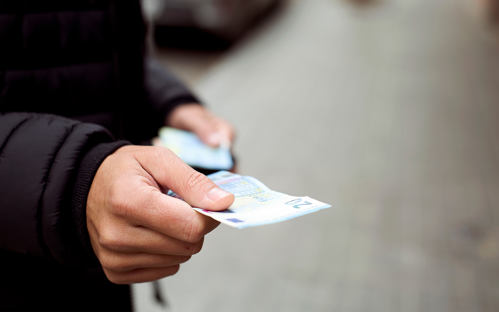 Exchanging euros during a guided tour in Europe.