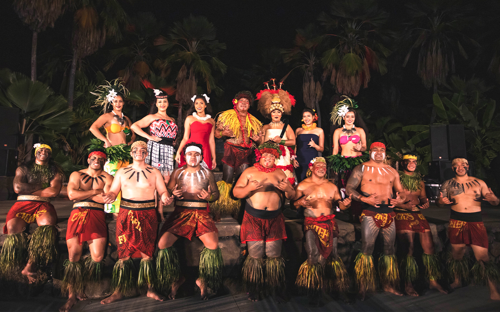 Performers in traditional attire at Chief's Luau, Oahu, Hawaii.