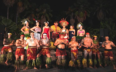 Performers in traditional attire at Chief's Luau, Oahu, Hawaii.