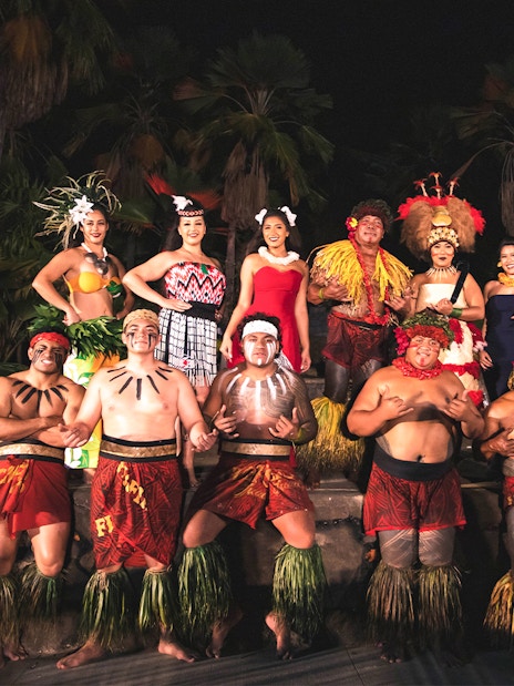Performers in traditional attire at Chief's Luau, Oahu, Hawaii.