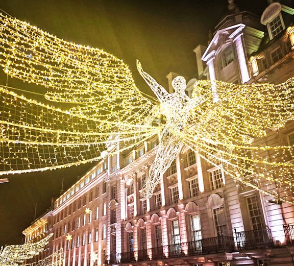 Christmas lights and angel decoration on Regent Street, London.