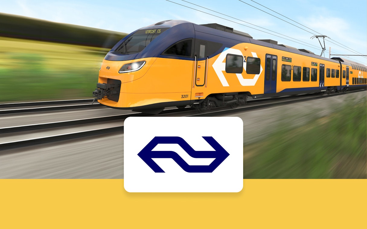NS train traveling between Schiphol Airport and Amsterdam.